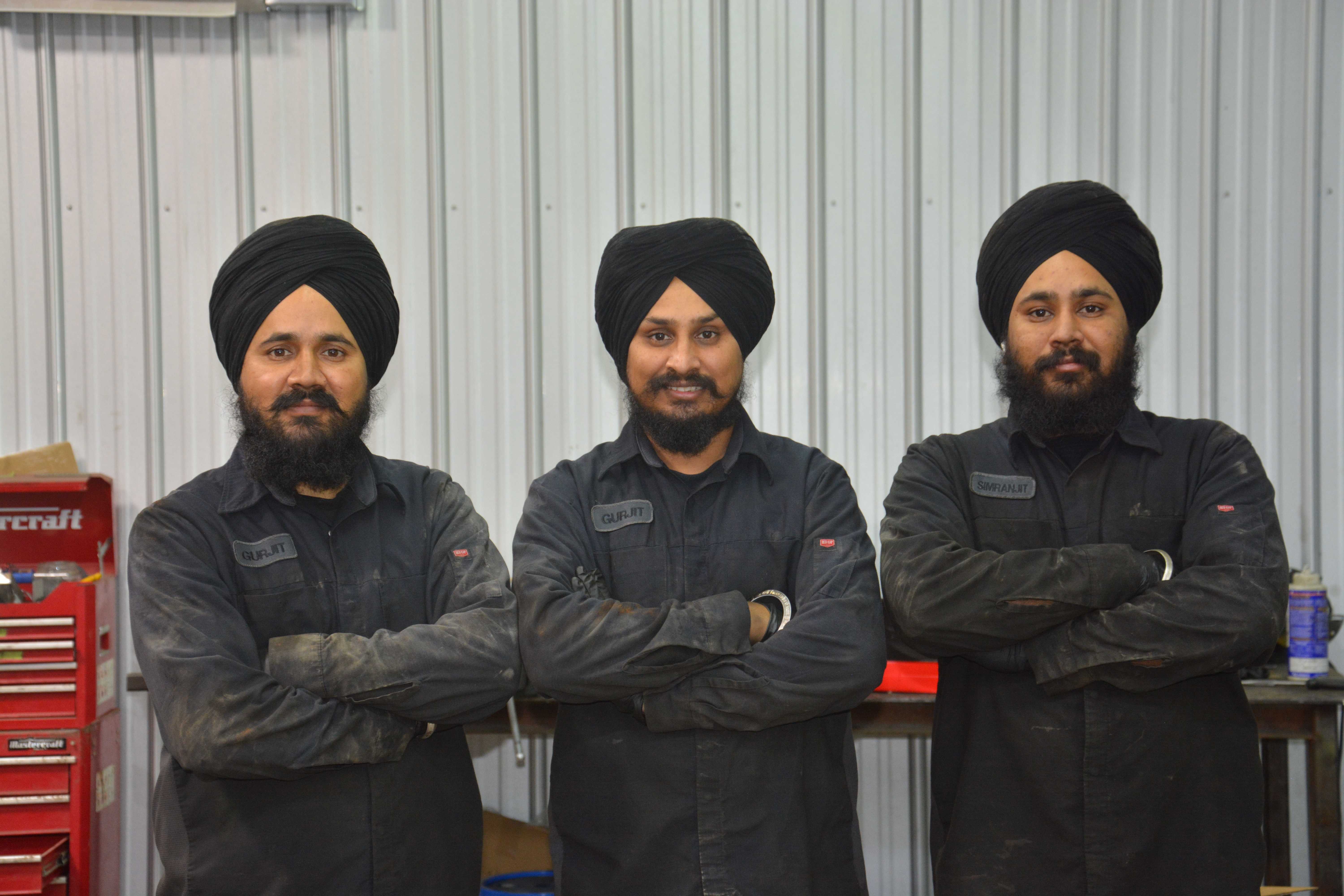 The three brothers - founders of Headon Tires and Auto Care